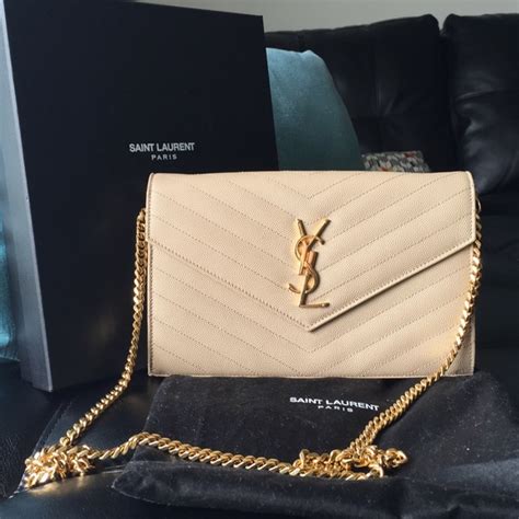 cream ysl bag.